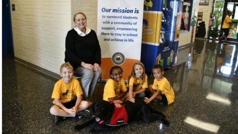 First Lady Justice with Shadow and four students