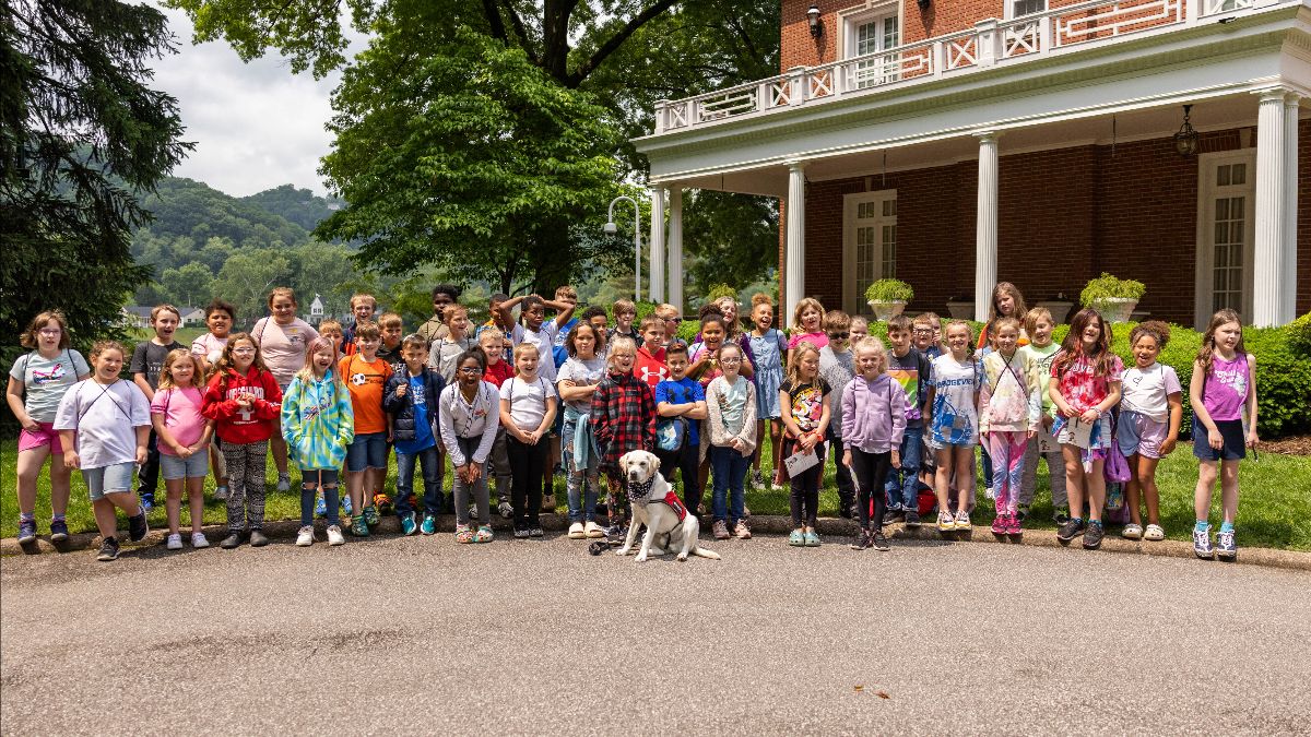 Therapy Dog Louie with Bridgeview Elementary School students
